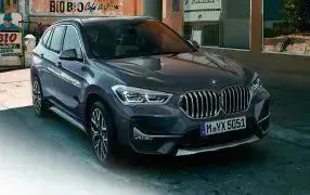 X1 BMW versand Kofferraummatte - Gratis